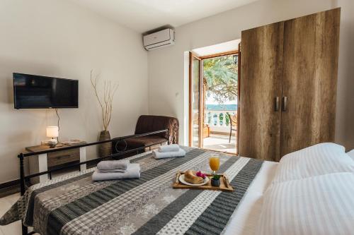 Una cama o camas en una habitación de Apartments Belvedere