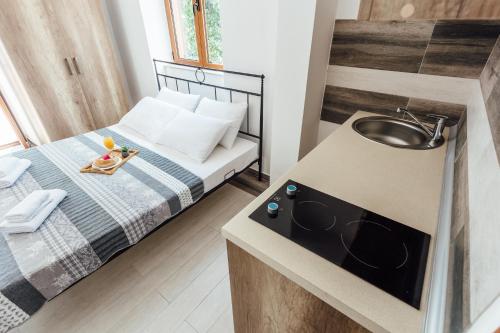 Una cama o camas en una habitación de Apartments Belvedere