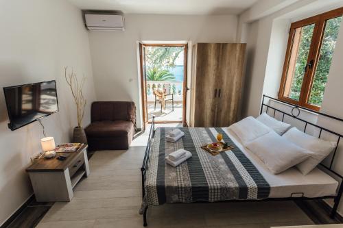Una cama o camas en una habitación de Apartments Belvedere