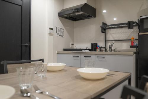 匠の家 大阪城近くの高級感あふれる吹き抜けの家 A Luxurious Home with a Grand Atrium Near Osaka Castle