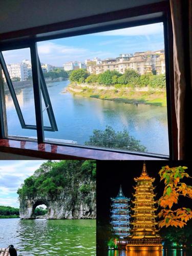 a view of a river from a window at Lakeside Inn in Guilin