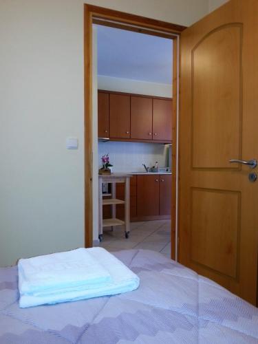 Ένα ή περισσότερα κρεβάτια σε δωμάτιο στο Vasilis Studios 