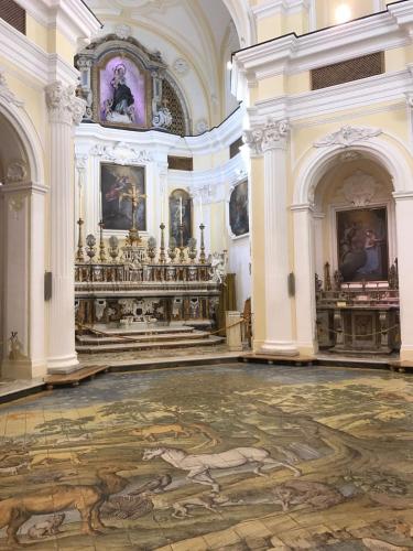 a large room with a large rug in a building at Capri Dreaming in Anacapri