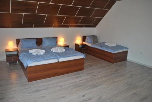 Postel nebo postele na pokoji v ubytování Apartment Mlýnská