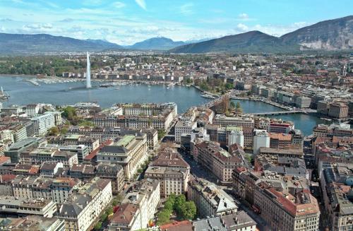 an aerial view of a city with a river and buildings at ibis budget Thonon Les Bains in Thonon-les-Bains