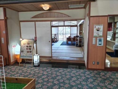 a lobby of a building with a door open at Southern Alps Kaikomagatake Foot of the Kaikoma in Hokuto