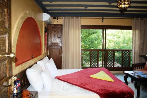 Ein Bett oder Betten in einem Zimmer der Unterkunft Riad Jnane Imlil