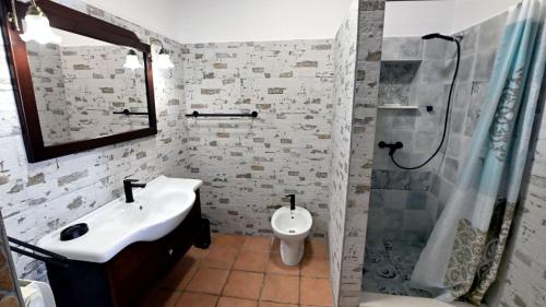 a bathroom with a sink and a shower and a toilet at Villa Buby by Villas Guide in Kraljevica