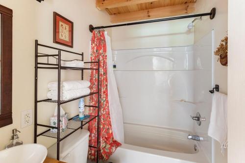 a bathroom with a shower and a toilet at Kettlestone in Stanton