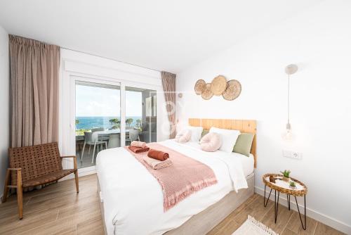 Beachfront Bliss apt, with heated pool, by OYOOSTAYS