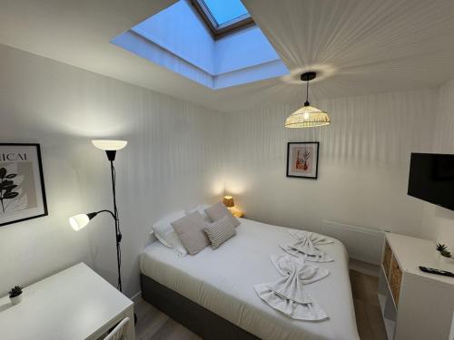 Llit o llits en una habitació de Studio moderne Amiens