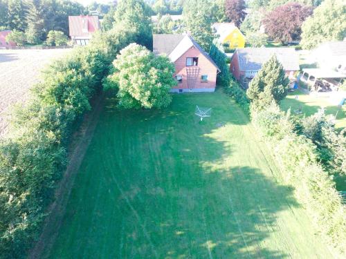 an aerial view of a yard with a house at Ferienhaus Kappeln in Rabenkirchen-Faulück