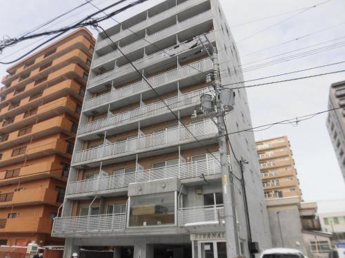 an apartment building with balconies on the side of it at ETERNAL/F　sapporo803 in Sapporo