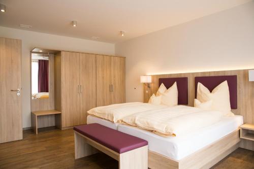 Krevet ili kreveti u jedinici u objektu Hotel Zur-Borke