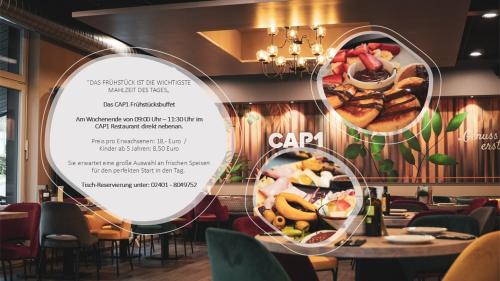 ein Restaurant mit Speisekarte und einem Tisch mit Essen in der Unterkunft CAP1 Boardinghouse in Baesweiler