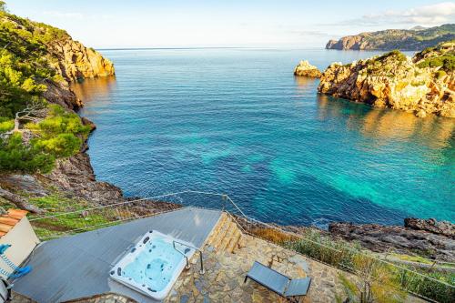 an aerial view of a body of water at Villa Ca La Dolors - Cala Deià, by PriorityVillas in Deia