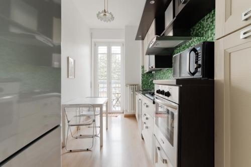 GuestHost - Cozy Flat near Gorla M1