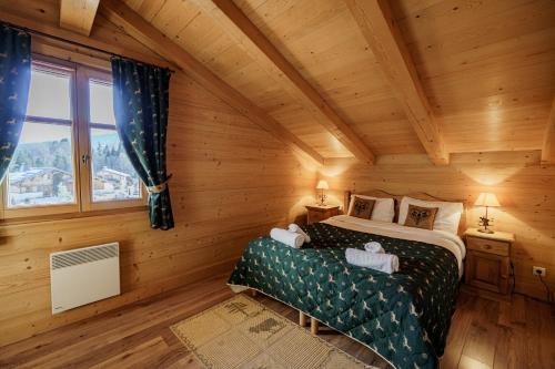 En eller flere senger på et rom på Chalet Panorama