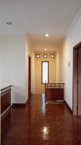 an empty room with a bed in the middle at Happy Place Antipolo in Antipolo