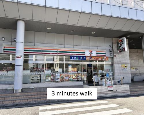 a minutes walk sign in front of a store at 77kawaramachi 新築一軒家 in Takamatsu