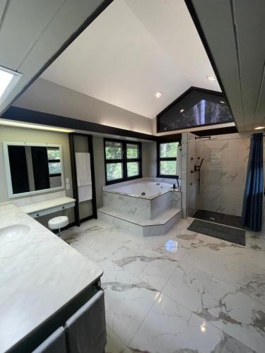 a bathroom being remodeled with a tub and sink at Hotel-Style Private Suite-Lake View-Gardens in Lake Wales