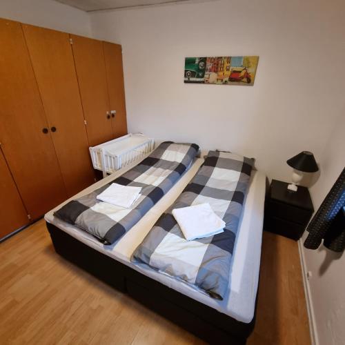 a large bed in a room with at Joysha's House in Ikast