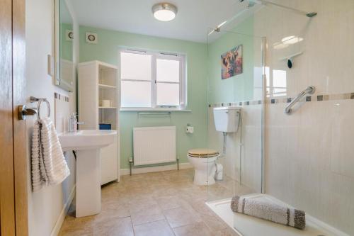 a bathroom with a sink toilet and a shower at 2 Bed in Coaley oc-s34729 in Coaley
