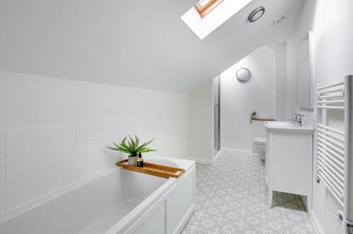 a white bathroom with a sink and a toilet at 2 Bed in Newton oc-ffba in Newton