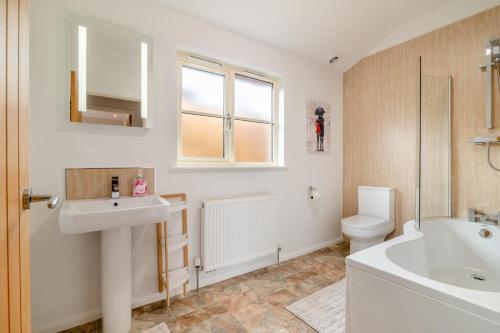 a bathroom with a sink and a toilet at 2 Bed in Coaley oc-r34730 in Coaley