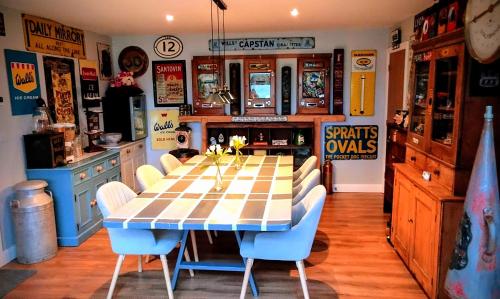 a dining room with a table and chairs at Englefield Guesthouse in Goathland