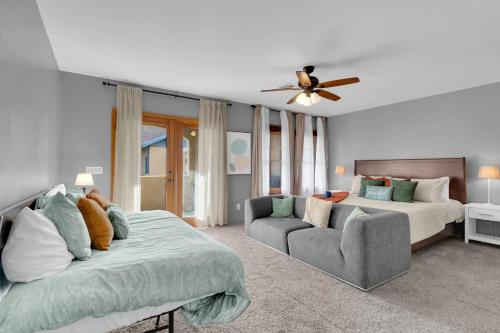 a living room with a bed and a couch at Kindroot 5 in Tucson