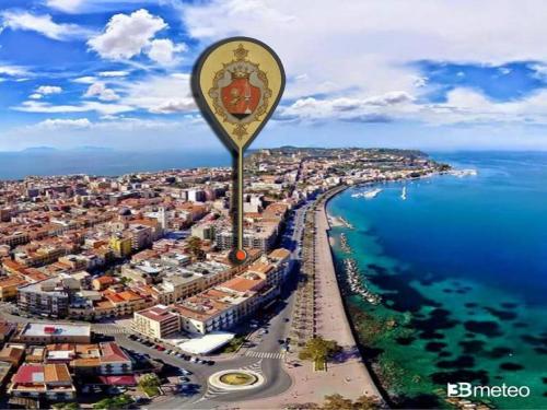 an aerial view of a city and the ocean at Hotel Medici in Milazzo