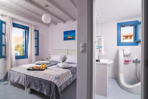 Postel nebo postele na pokoji v ubytování Evgenia Residences