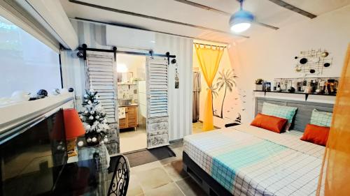 Llit o llits en una habitació de Le LiloVert - Studio 24 m2