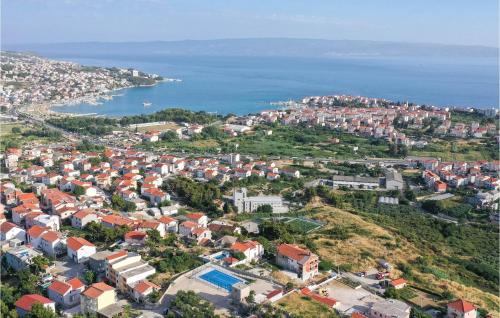 an aerial view of a city and the ocean at Stunning Apartment In Split in Split