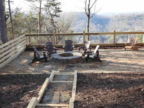 a fire pit in the middle of a yard at Majestic Mountaintop Escape in Blue Ridge