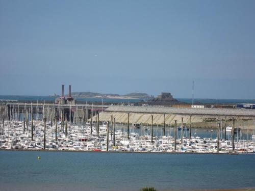 a group of boats are docked at a marina at Manoir Du Cunningham in Saint Malo
