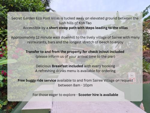 a sign for the secret garden for food walk walks is tucked away on elevated ground at Secret Garden Eco Pool Villas in Ko Tao