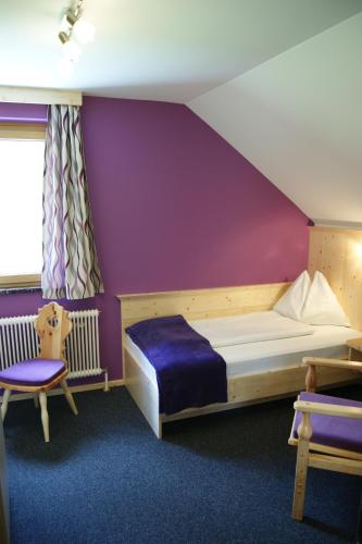 Postel nebo postele na pokoji v ubytování Hotel Haus Lungau