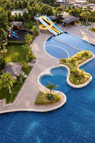 an aerial view of a water park with a slide at Alodger Sirius Town Lara in Aksu