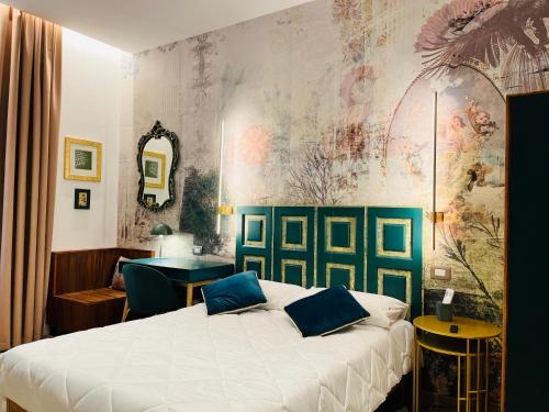 Foto ARIOSTO'S Luxury Rooms 2