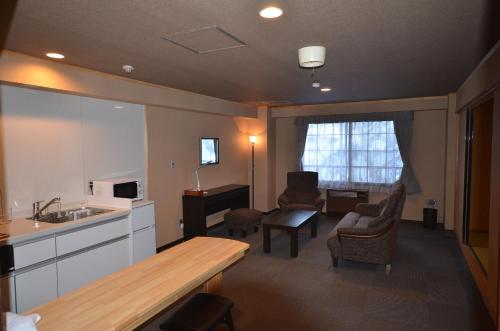 Televisyen dan/atau pusat hiburan di Shiga Palace Hotel