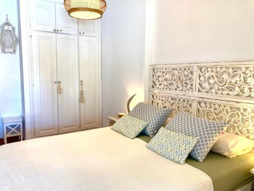 a bedroom with a bed with two pillows at Ocean Breeze & View Médano in El Médano
