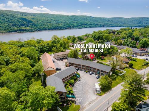 an aerial view of a west point motel with a river at West Point Motel in Highland Falls