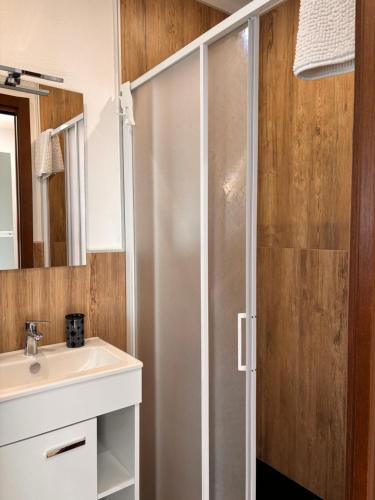 a bathroom with a shower and a sink at La Casetta in Grotte di Castro