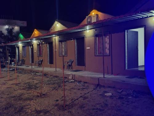 a row of houses under construction at night at Fortune Heritage Resort in Baori Thikria