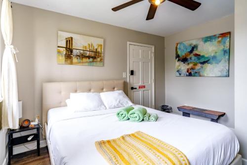 a bedroom with a bed with two stuffed animals on it at Jungle House Columbus Downtown Free Parking Sleeps 6 - Steps to Convention Center & Nationwide Arena - 1BR Short North Luxury Home - Over 5,800 Five Star Stays in Columbus