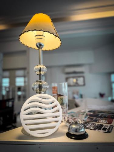 a lamp sitting on top of a table at Mar y Cielo in Necochea