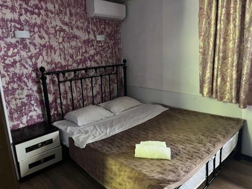 Llit o llits en una habitació de Studio Bucuresti-Centru