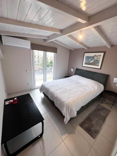 Ένα ή περισσότερα κρεβάτια σε δωμάτιο στο Gela